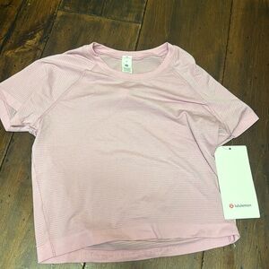 size 8 pink cropped lululemon swiftly align top
